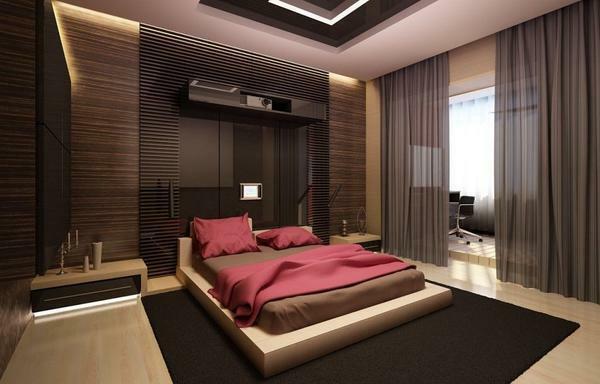 Atributos dos quartos modernos são luzes de néon perto dos armários e aparelhos eletrônicos de parede
