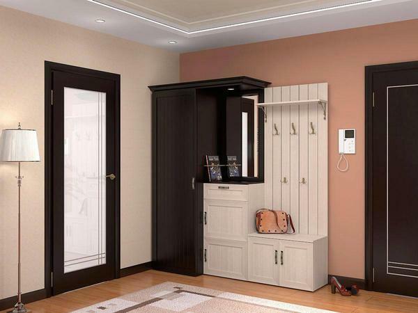 To avoid monotony in the hallway, you should choose furniture of a shade that is different from the color of the walls