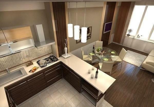 Het ontwerp van de keuken-woonkamer, gezoneerd door middel van meubels, is de meest voorkomende