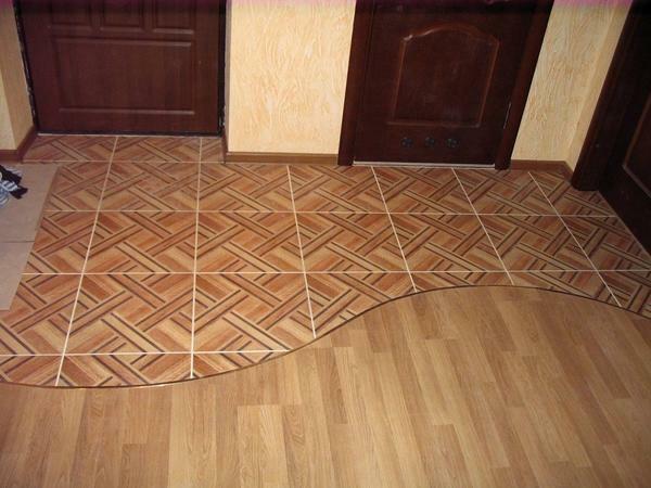 To prevent monotony, it is necessary to combine floor coverings, for example, laminate with tiles