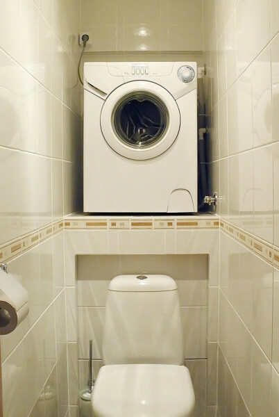This embodiment allows to place the washing machine in close lavatory