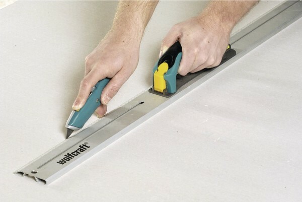 Cut the plasterboard with a sharp knife